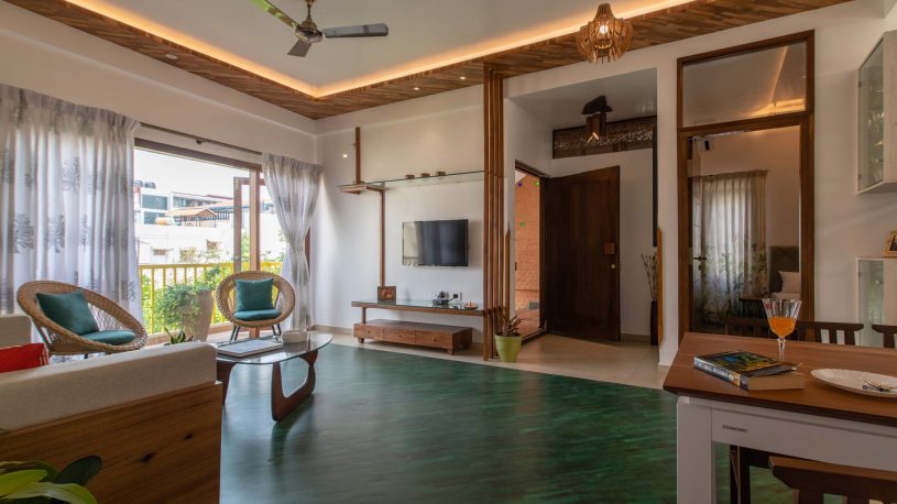 The Wood apartment's living room, dining room in the Jazminn, luxury service apartments in Kalyan Nagar
