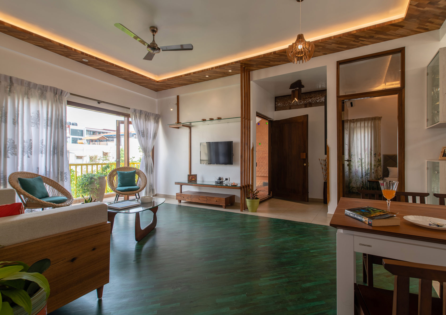The Wood apartment's living room, dining room in the Jazminn, luxury service apartments in Kalyan Nagar